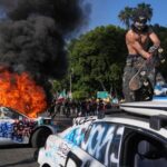 Who is rioting in downtown L.A.,...