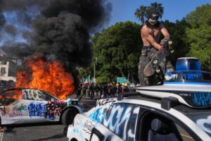 Who is rioting in downtown L.A.,...