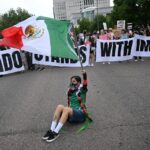 Denver protesters decry ICE enforcement; police...