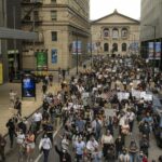 Car plows through Chicago protest as...